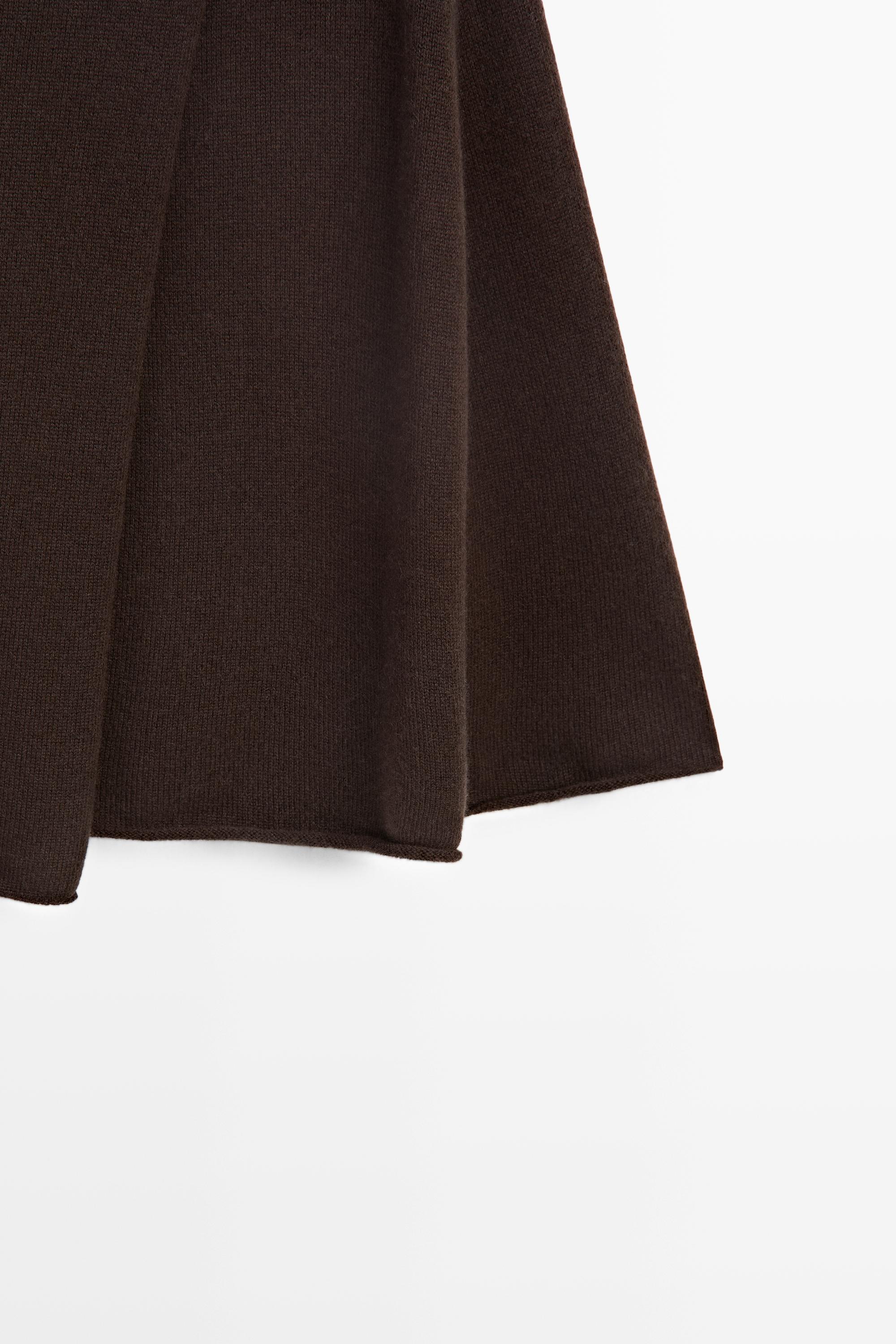 100% cashmere knit cape with crossover detail
